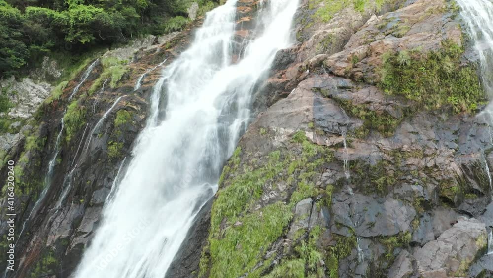 Ohko Waterfall, Slowly Rising to Reveal Peak on Yakushima Japan Ohko Waterfall, Slowly Rising to Reveal Peak on Yakushima Japan