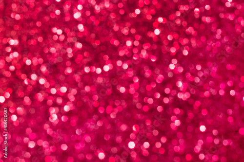 Abstract rose and pink glitter lights background. Circle blurred bokeh. Romantic backdrop for Valentines day, womens day, holiday or event