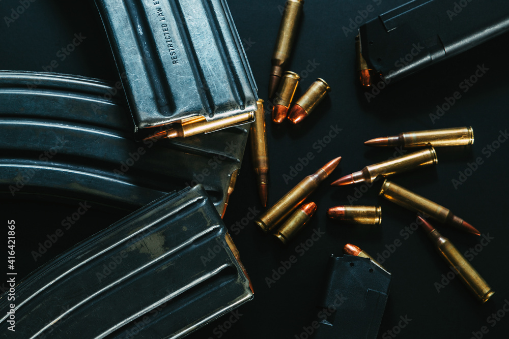 Rifle magazine on black background. Rifle pistol bullets close-up ...