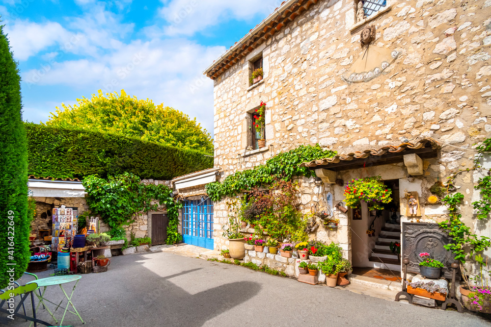 A colorful shop and residence in the medieval hilltop village of Gourdon, France, in the Alpes-Maritimes region.