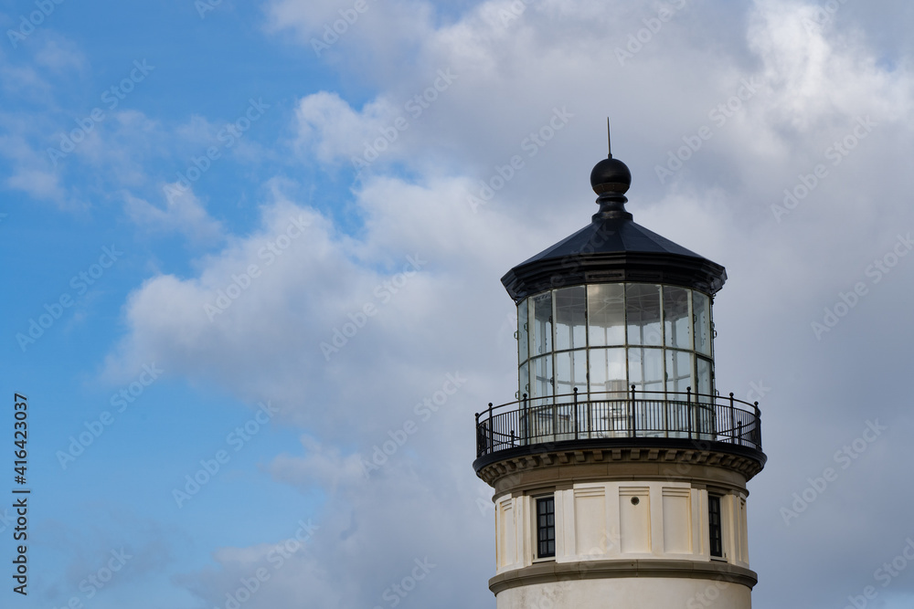 North Head Lighthouse.  It is an active aid to navigation overlooking the Pacific Ocean from North Head, a rocky promontory located approximately two miles north of  the mouth of the Columbia River.