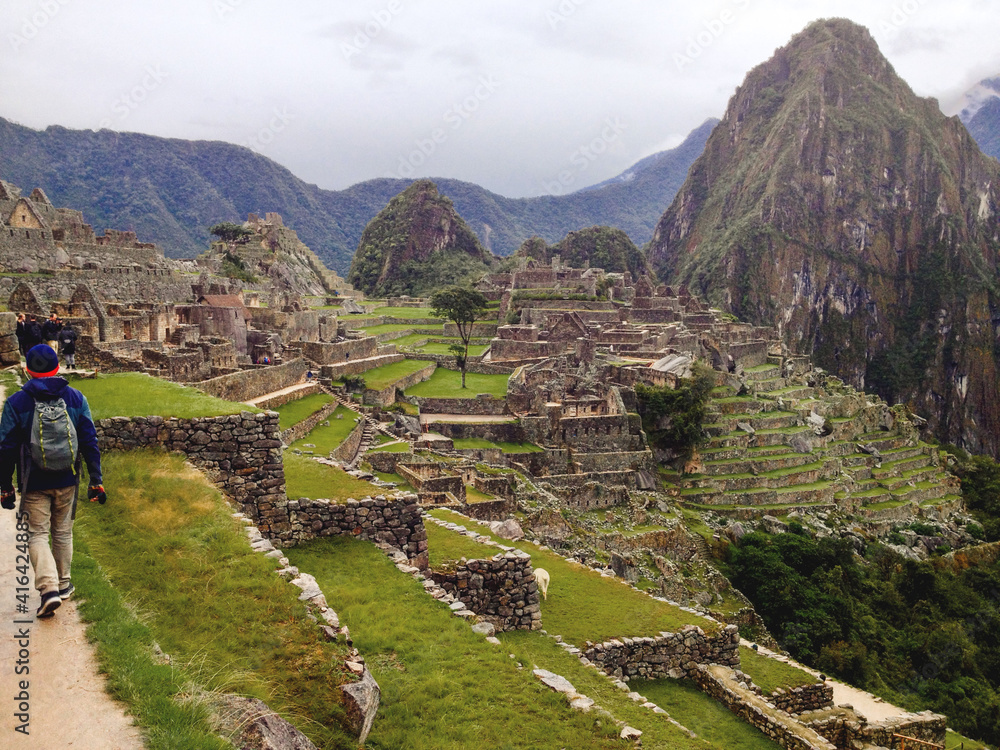Inca Ruins of Machu Picchu, Peru in a cloudy day.