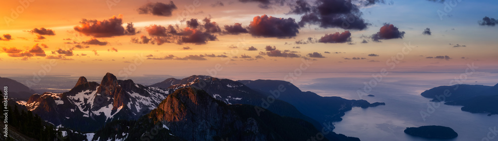 Naklejka premium Panoramic landscape view of Howe Sound during a vibrant summer morning. Dramatic Sunrise Sky Art Render. Taken from the top of Brunswick Mountain, North of Vancouver, BC, Canada. Nature Background