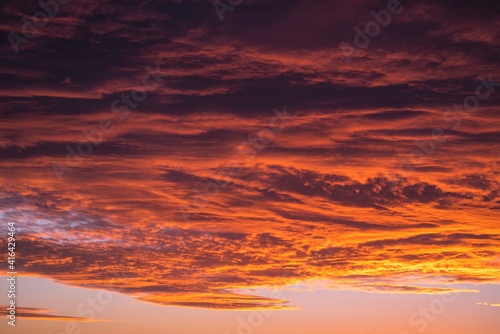 This image shows a vast sunset sky filled with large clouds.  © Gypsy Picture Show