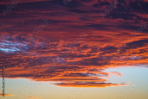 This image showcases a sunset sky illuminating colorful clouds. © Gypsy Picture Show