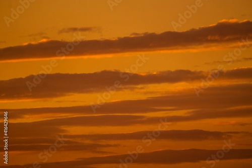 This image shows a hazy orange cloudscape sky. © Gypsy Picture Show