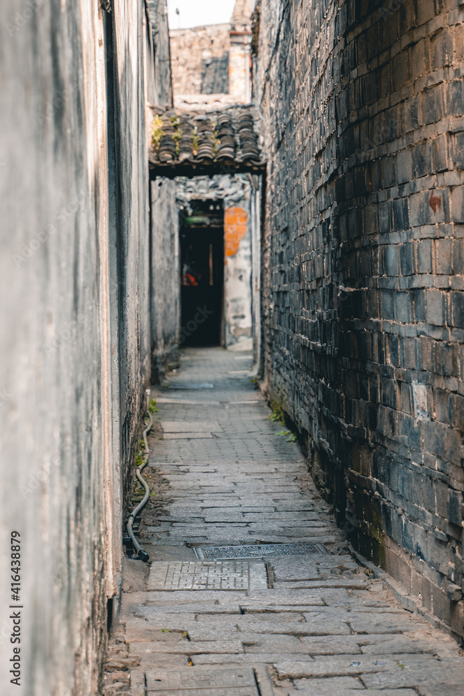 A small alley in a traditional ancient Chinese town. A small alley in a traditional ancient Chinese town.