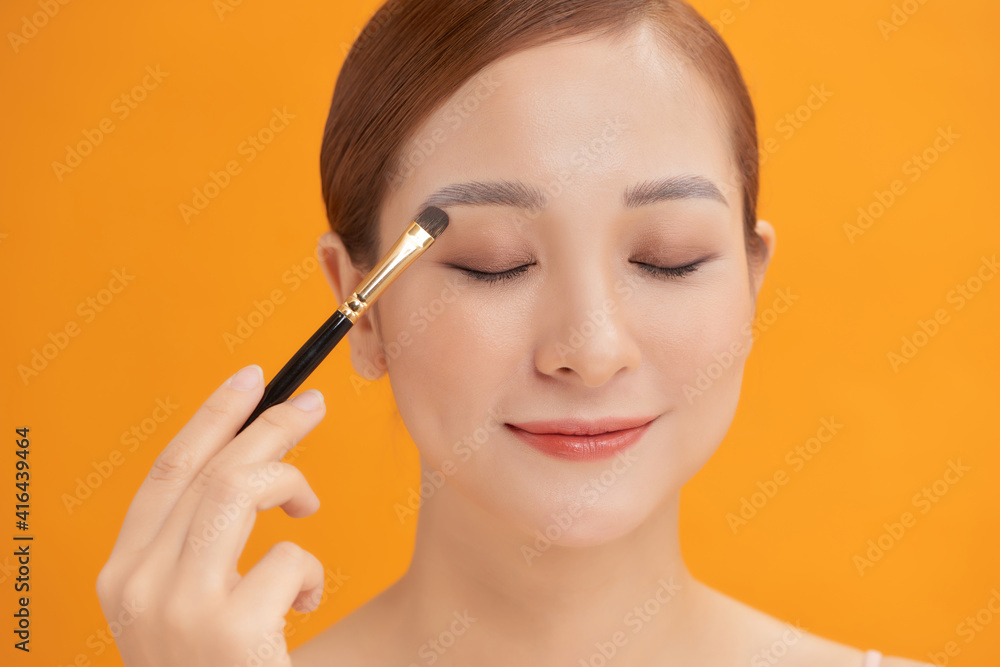Fototapeta premium Beauty Asian Girl with Cosmetics Makeup.