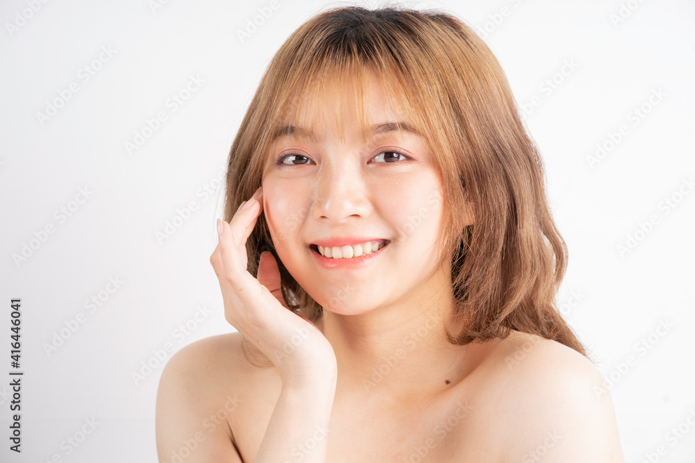 Beautiful xing woman with fresh skin smiling on background Beautiful xing woman with fresh skin smiling on background
