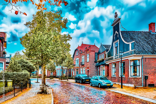 Typical, authentic village with cozy houses of the countryside in the Netherlands.