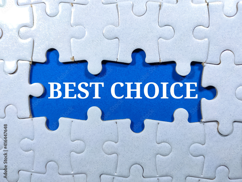 Selective focus.Word BEST CHOICE with jigsaw puzzle on blue background.Business concept. Selective focus.Word BEST CHOICE with jigsaw puzzle on blue background.Business concept.