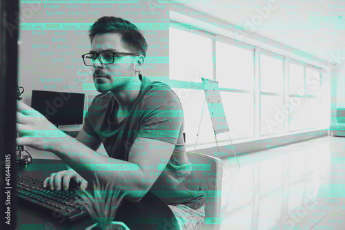 Male programmer working in ...