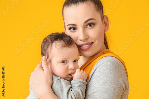 Young mother with little ba...