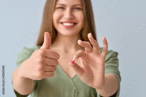 Beautiful young woman with ...