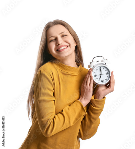 Young woman with clock on w...
