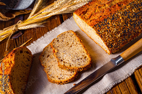 Flaxseed bread with a poppy seed and sesame mixture photo