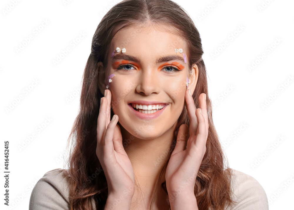 Portrait of beautiful young woman with creative makeup on white background Portrait of beautiful young woman with creative makeup on white background