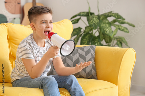 Screaming little boy with m...