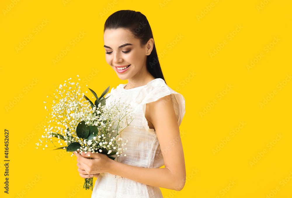 Beautiful young woman with flowers on color background Beautiful young woman with flowers on color background
