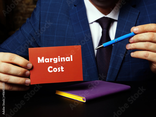 Conceptual photo about Marginal Cost with written phrase red business card.
