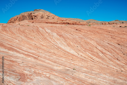 Fire Wave at Valley of Fire is a banded red and white sandstone formation a short hike away from parking lot 3.