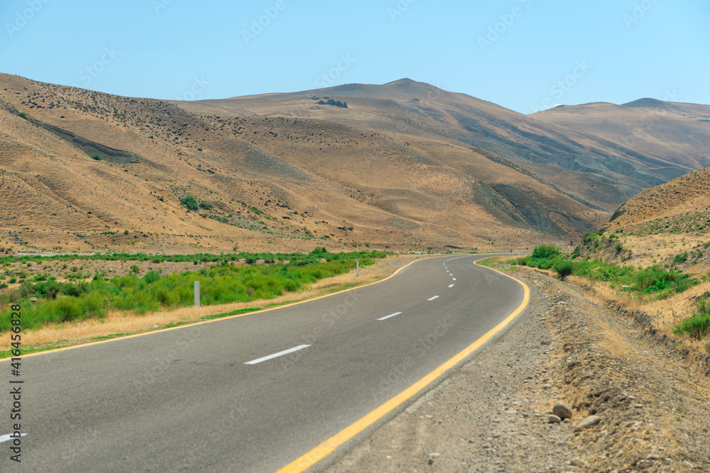 Scenic motor road in the desert mountains of Azerbaijan landscape