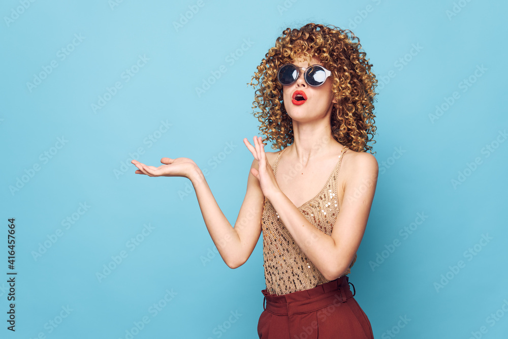 Woman portrait Curly hair red lips dark glasses hand gestures Copy Space Woman portrait Curly hair red lips dark glasses hand gestures Copy Space