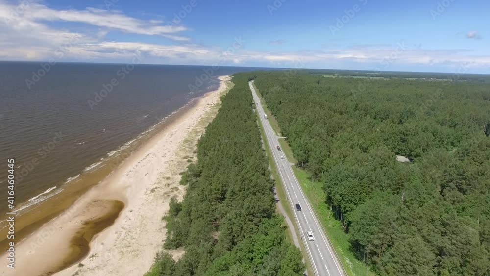 High aerial view of the road and beach of Rozkalni in Latvia High aerial view of the road and beach of Rozkalni in Latvia