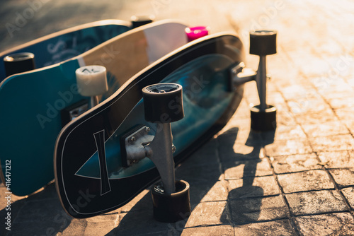 Canvas Print Close up surf skate or skateboard at park sunset