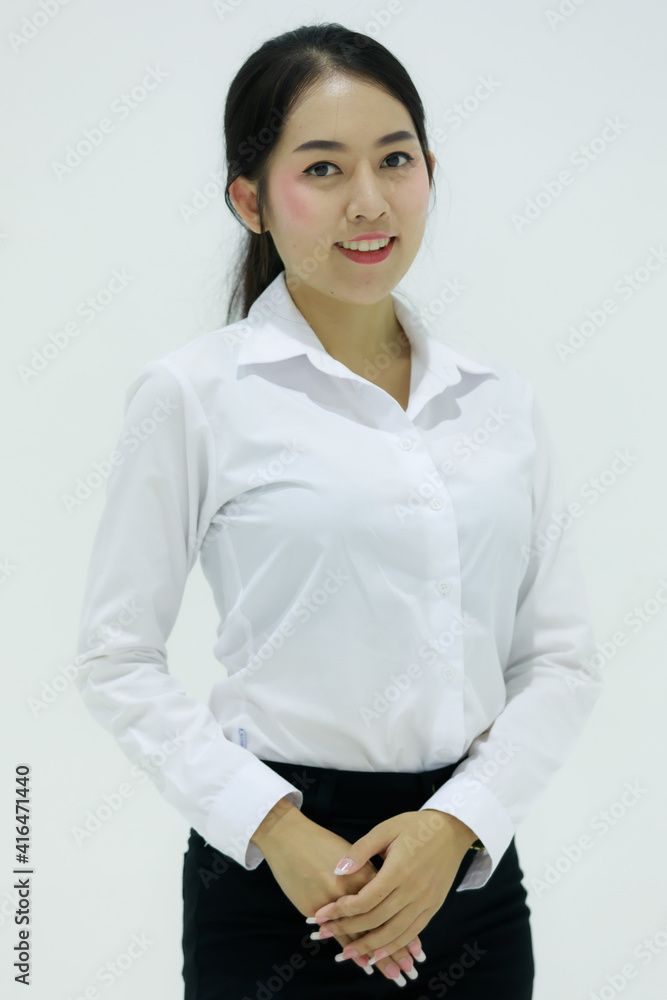 Asian Young beautiful brunette businesswoman smiling looking at camera in side over white background. Concept business woman manager. Asian Young beautiful brunette businesswoman smiling looking at camera in side over white background. Concept business woman manager.