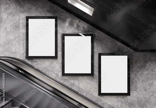 Three vertical billboards on underground wall Mockup. Hoardings advertising triptych on subway wall 3D rendering