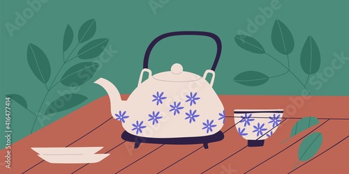 Traditional Chinese tea ceremony concept. Teapot with floral pattern, cup and...