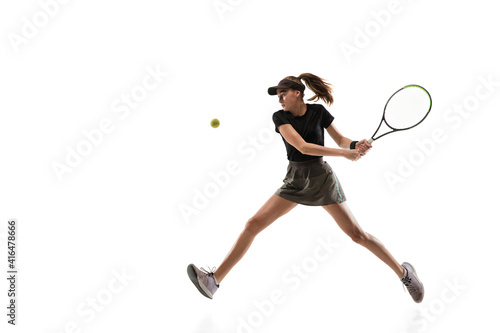 Speed. Young caucasian professional sportswoman playing tennis isolated on white background. Training, practicing in motion, action. Power and energy. Movement, ad, sport, healthy lifestyle concept.