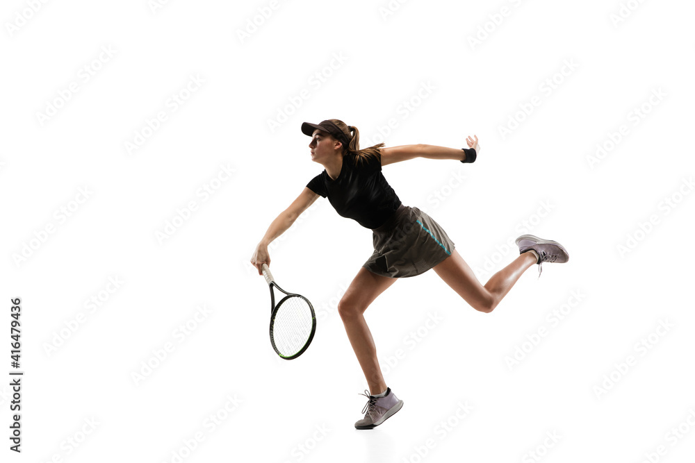 Running. Young caucasian professional sportswoman playing tennis isolated on white background. Training, practicing in motion, action. Power and energy. Movement, ad, sport, healthy lifestyle concept.