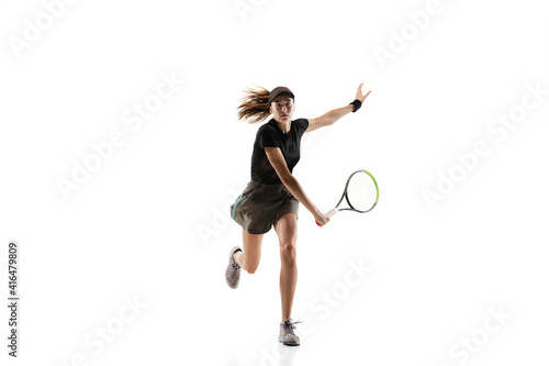 Youth. Young caucasian professional sportswoman playing tennis isolated on white background. Training, practicing in motion, action. Power and energy. Movement, ad, sport, healthy lifestyle concept. © master1305