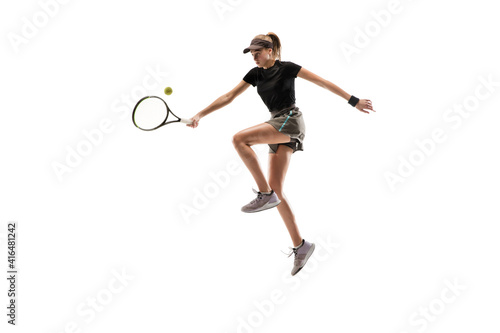 Leader. Young caucasian professional sportswoman playing tennis isolated on white background. Training, practicing in motion, action. Power and energy. Movement, ad, sport, healthy lifestyle concept. © master1305