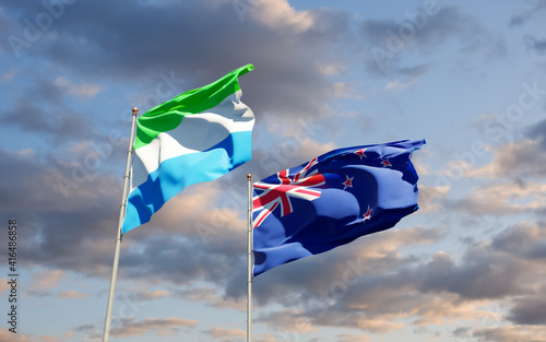 Flags of Sierra Leone and New Zealand.