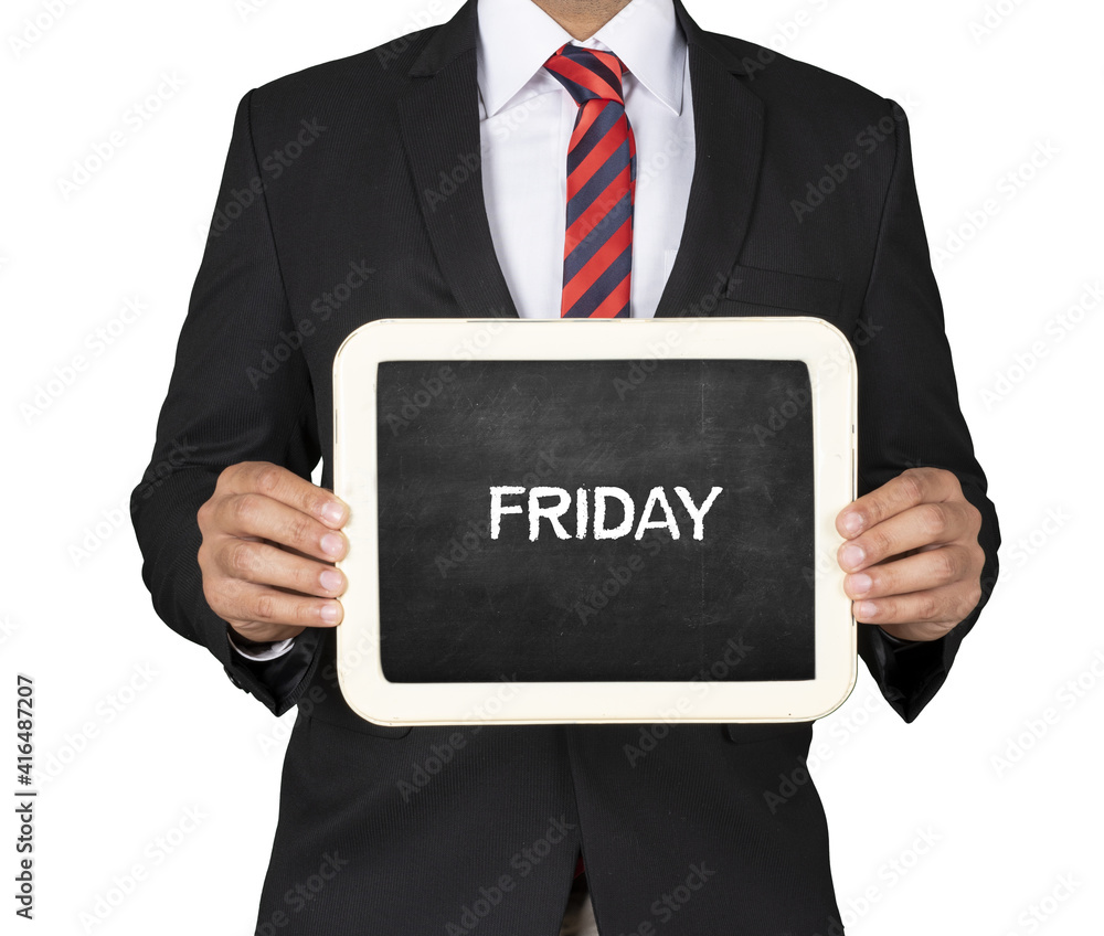 A Businessman holding slate mini blackboard with Friday message A Businessman holding slate mini blackboard with Friday message