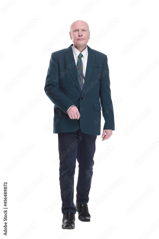 Mature business man striding forward. isolated on a white background. Mature business man striding forward. isolated on a white background.