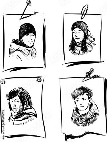 Sketches of portraits of teenage students on sheets of paper