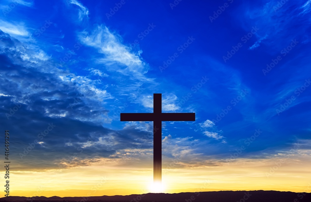 The cross of God in the rays of the sun. Background of religions