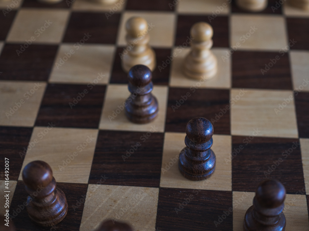 Close-up chess board with slav defense opening. Board games concept Close-up chess board with slav defense opening. Board games concept
