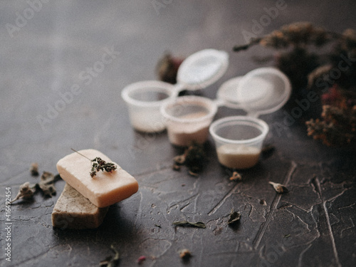 Spa. herbal soap, natural ingredients. samples of cosmetics on a gray background