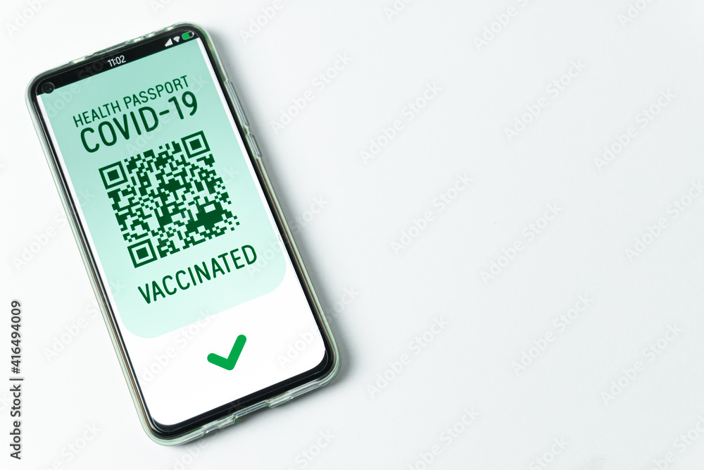 Fototapeta premium Vaccinated - Digital Health Passport Covid-19 App Smartphone