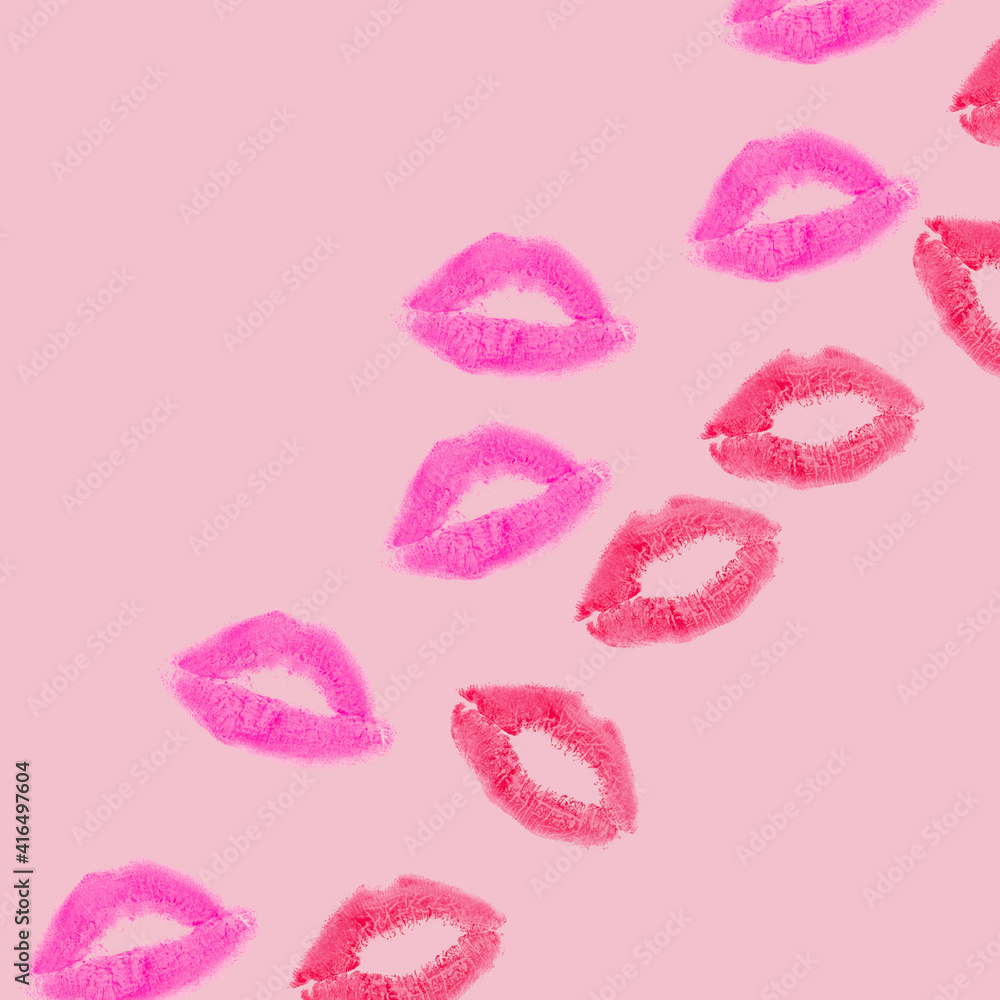 Creative pattern made with purple and red kisses on pastel pink background. Retro style aesthetic. Romantic concept with kiss print and lipstick. Makeup idea. Creative pattern made with purple and red kisses on pastel pink background. Retro style aesthetic. Romantic concept with kiss print and lipstick. Makeup idea.