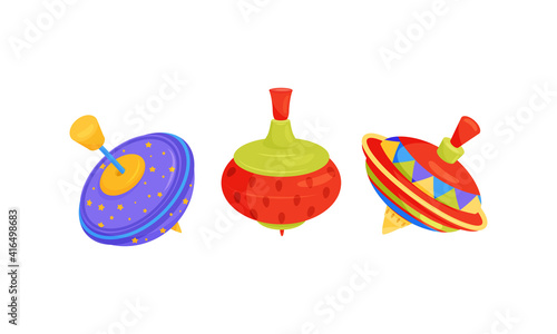 Colorful Spinning Top as Children Toy with Sharp Point for Balancing Vector Set