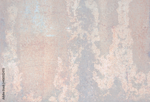 Abstraction pastel background with shades of pink, brown, gray. Corroded metal background. Oxidized metal, enamel, rusty metal texture, surface with rust streaks and scratches.