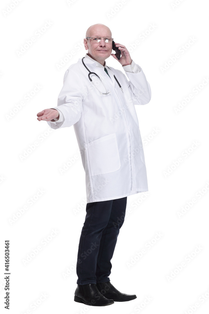 man doctor talking on a mobile phone. isolated on a white background.