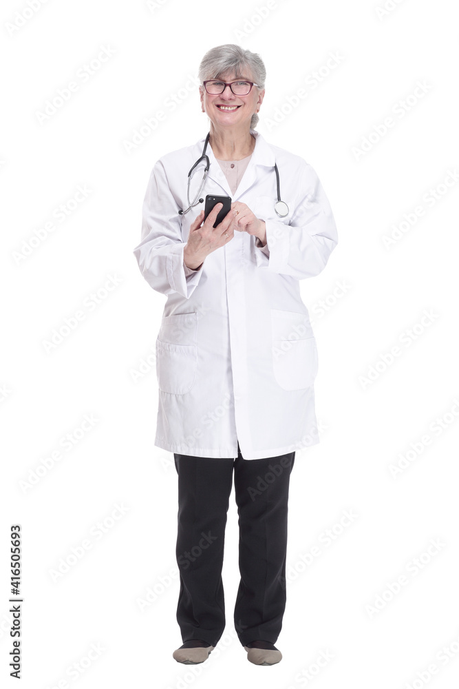 smiling female doctor with smartphone looking at you . smiling female doctor with smartphone looking at you .