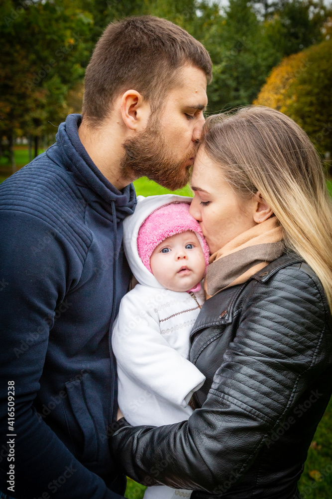 parent kissing their child parent kissing their child